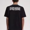 Avslappnad herr-T-shirt med tryck och lappar Avslappnad herr-T-shirt med tryck och lappar
