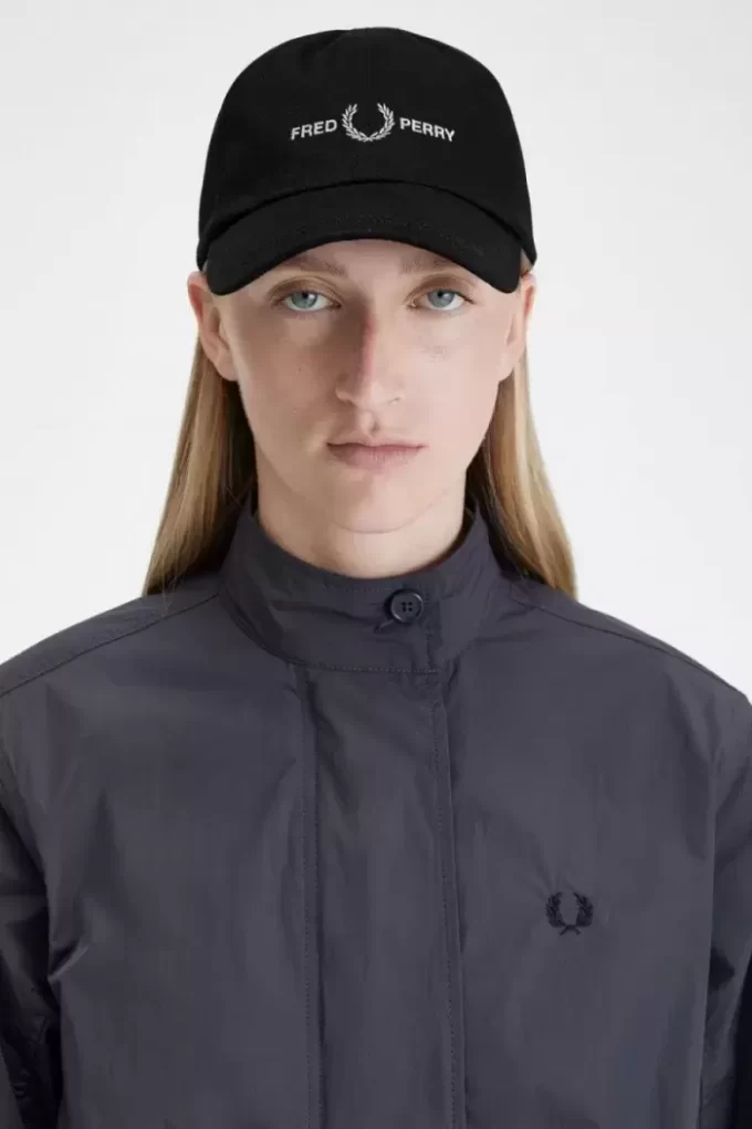Herrkepsar med grafisk märkestryck i twill