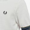 Randiga stickade t-shirts med manschett Randiga stickade t-shirts med manschett