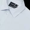 Överdimensionerad herrskjorta med lappdetalj Överdimensionerad herrskjorta med lappdetalj